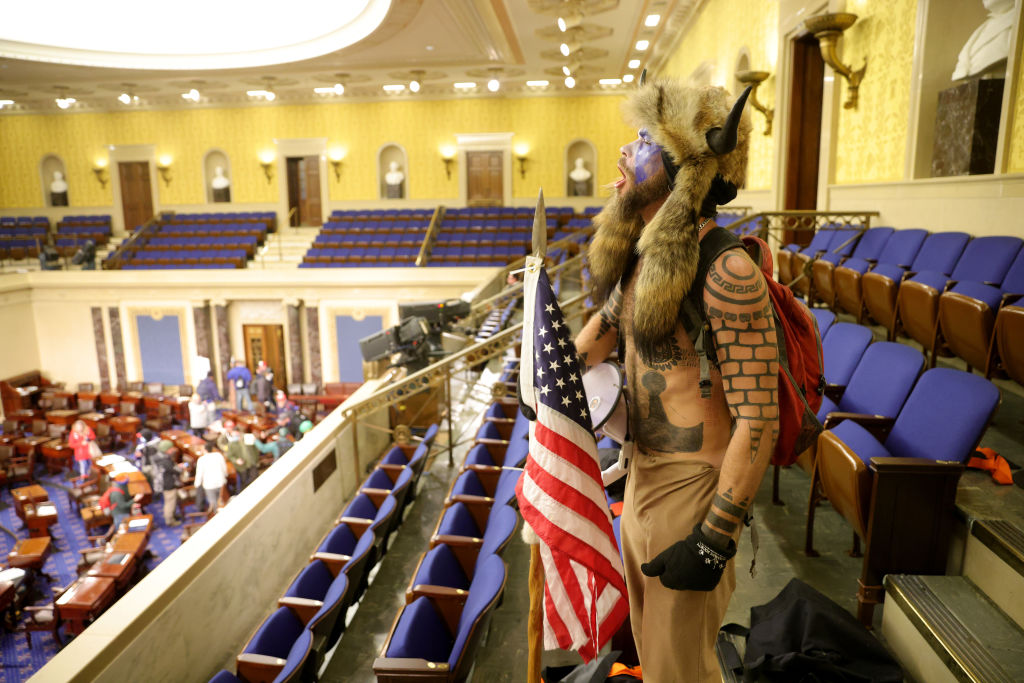 Jake Angeli, the man who entered the Capitol dressed as a buffalo, is arrested