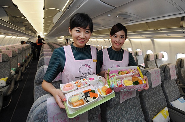 Flight attandants with the Hello Kitty meals