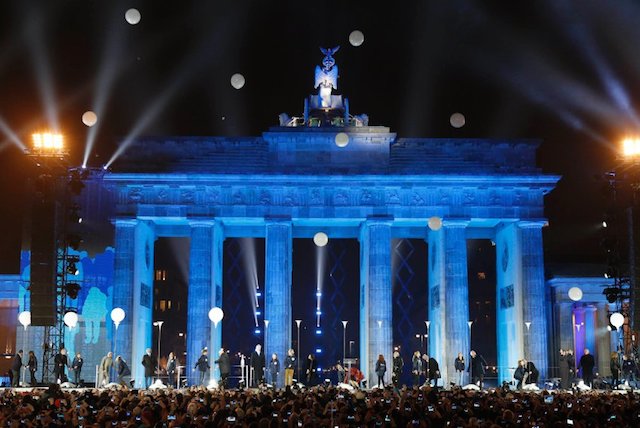 Balloons from installation Border of Light are released in front Brandenburg Gate in Berlin