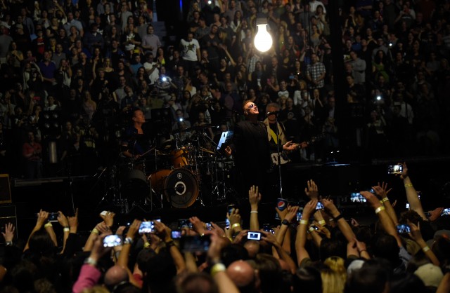 VANCOUVER, BC - MAY 14:  (L-R) Musicians Larry Mullen Jr., Bono and Adam Clayton of U2 perform onstage during the U2 iNNOCENCE + eXPERIENCE tour opener in Vancouver at Rogers Arena on May 14, 2015 in Vancouver, Canada.  (Photo by Kevin Mazur/WireImage) *** Local Caption *** Larry Mullen Jr.;Bono;Adam Clayton