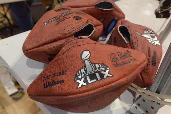 Jan 24, 2015; Phoenix, AZ, USA; Deflated footballs with Super Bowl XLIX logo at the NFL Experience at Phoenix Convention Center in advance of the game between the Seattle Seahawks and the New England Patriots. Mandatory Credit: Kirby Lee-USA TODAY Sports