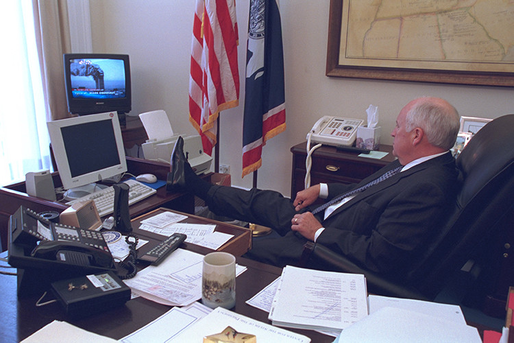 U.S. Vice President Dick Cheney watches television reports in Washington in the hours following the September 11, 2001 attacks in this U.S. National Archives handout photo obtained by Reuters July 24, 2015. REUTERS/U.S. National Archives/Handout via Reuters (MILITARY POLITICS DISASTER) THIS IMAGE HAS BEEN SUPPLIED BY A THIRD PARTY. IT IS DISTRIBUTED, EXACTLY AS RECEIVED BY REUTERS, AS A SERVICE TO CLIENTS. FOR EDITORIAL USE ONLY. NOT FOR SALE FOR MARKETING OR ADVERTISING CAMPAIGNS - RTX1LQAZ