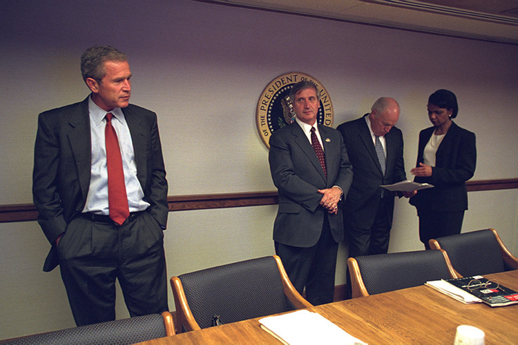 U.S. President George Bush (L) is pictured with U.S. Vice President Dick Cheney and National Security Advisor Condoleezza Rice (R) in the President's Emergency Operations Center in Washington in the hours following the September 11, 2001 attacks in this U.S National Archives handout photo obtained by Reuters July 24, 2015. REUTERS/U.S. National Archives/Handout via Reuters (MILITARY POLITICS DISASTER) THIS IMAGE HAS BEEN SUPPLIED BY A THIRD PARTY. IT IS DISTRIBUTED, EXACTLY AS RECEIVED BY REUTERS, AS A SERVICE TO CLIENTS. FOR EDITORIAL USE ONLY. NOT FOR SALE FOR MARKETING OR ADVERTISING CAMPAIGNS - RTX1LQAX