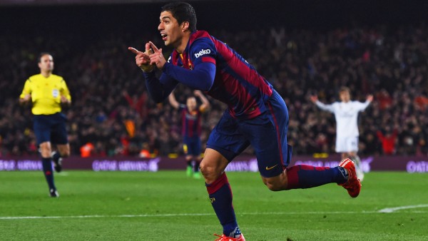 BARCELONA, SPAIN - MARCH 22:  Luis Suarez of Barcelona celebrates as he scores their second goal during the La Liga match between FC Barcelona and Real Madrid CF at Camp Nou on March 22, 2015 in Barcelona, Spain.  (Photo by David Ramos/Getty Images)