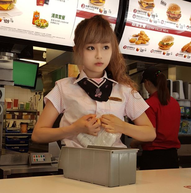 $PAY-Woman-Hsu-Wei-han-working-at-the-front-counter-of-a-McDonalds-restaurant
