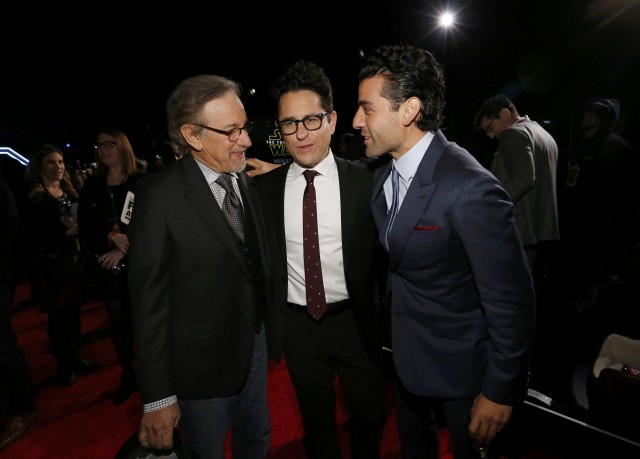 Directors Speilberg and Abrahms and actor Isaac arrive at the premiere of "Star Wars: The Force Awakens" in Hollywood