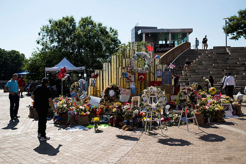 LOUISVILLE, KY - JUNE 10: People walk around a memorial decorated with tributes to Muhammad Ali at the Muhammad Ali Center on June 10, 2016 in Louisville, Kentucky. After the funeral and the eulogy, people reconvened at the Muhammed Ali Center to celebrate the life of the iconic sports figure. (Photo by Ty Wright/Getty Images)