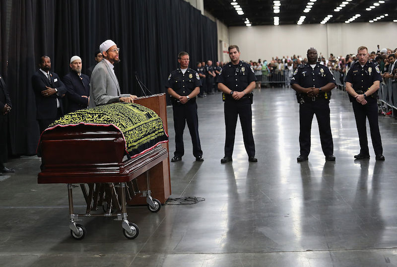 LOUISVILLE, KY - JUNE 09: Police stand guard during an Islamic prayer service for Muhammad Ali at the Kentucky Exposition Center on June 9, 2016 in Louisville, Kentucky. The Jenazah service was held for the four-time world heavyweight boxing champion, who died on June 3 at age 74, A procession and memorial service are scheduled for Friday. (Photo by John Moore/Getty Images)