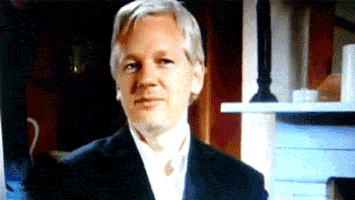 Julian-Assange-Smile-GIF