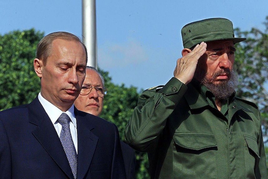 383321 10: Cuban President Fidel Castro, right, salutes as he welcomes Russian President Vladimir Putin to Cuba December 14, 2000 at the Palace of the Revolution in Havana, Cuba. Putin is the first President of Russia to visit Cuba since the fall of the Berlin Wall. (Photo by Jorge Rey/Newsmakers)