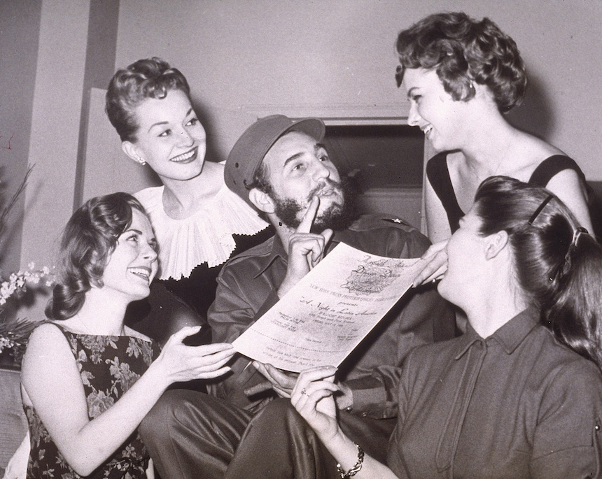 Cuban leader Fidel Castro is presented with an invitation to the New York Press Photographer's Ball, New York City, April 23, 1959. (Photo by Hulton Archive/Getty Images)