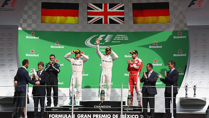 MEXICO CITY, MEXICO - OCTOBER 30: Top three finishers Lewis Hamilton of Great Britain and Mercedes GP, Nico Rosberg of Germany and Mercedes GP and Sebastian Vettel of Germany and Ferrari celebrate on the podium during the Formula One Grand Prix of Mexico at Autodromo Hermanos Rodriguez on October 30, 2016 in Mexico City, Mexico. (Photo by Clive Mason/Getty Images)