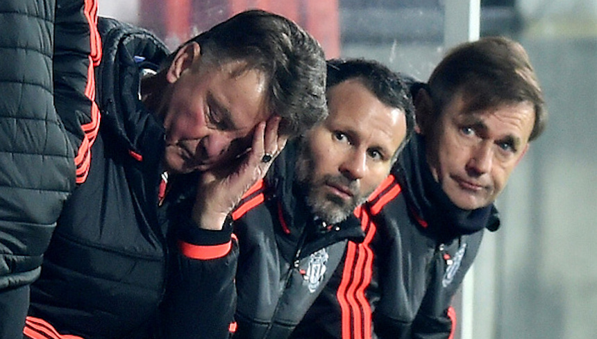 HERNING, DENMARK - FEBRUARY 18: Louis van Gaal (L) Manager of Manchester United scratches his head while Ryan Giggs (C) assistant manager looks on during the UEFA Europa League round of 32 first leg match between FC Midtjylland and Manchester United at Herning MCH Multi Arena on February 18, 2016 in Herning, Denmark. (Photo by Michael Regan/Getty Images)