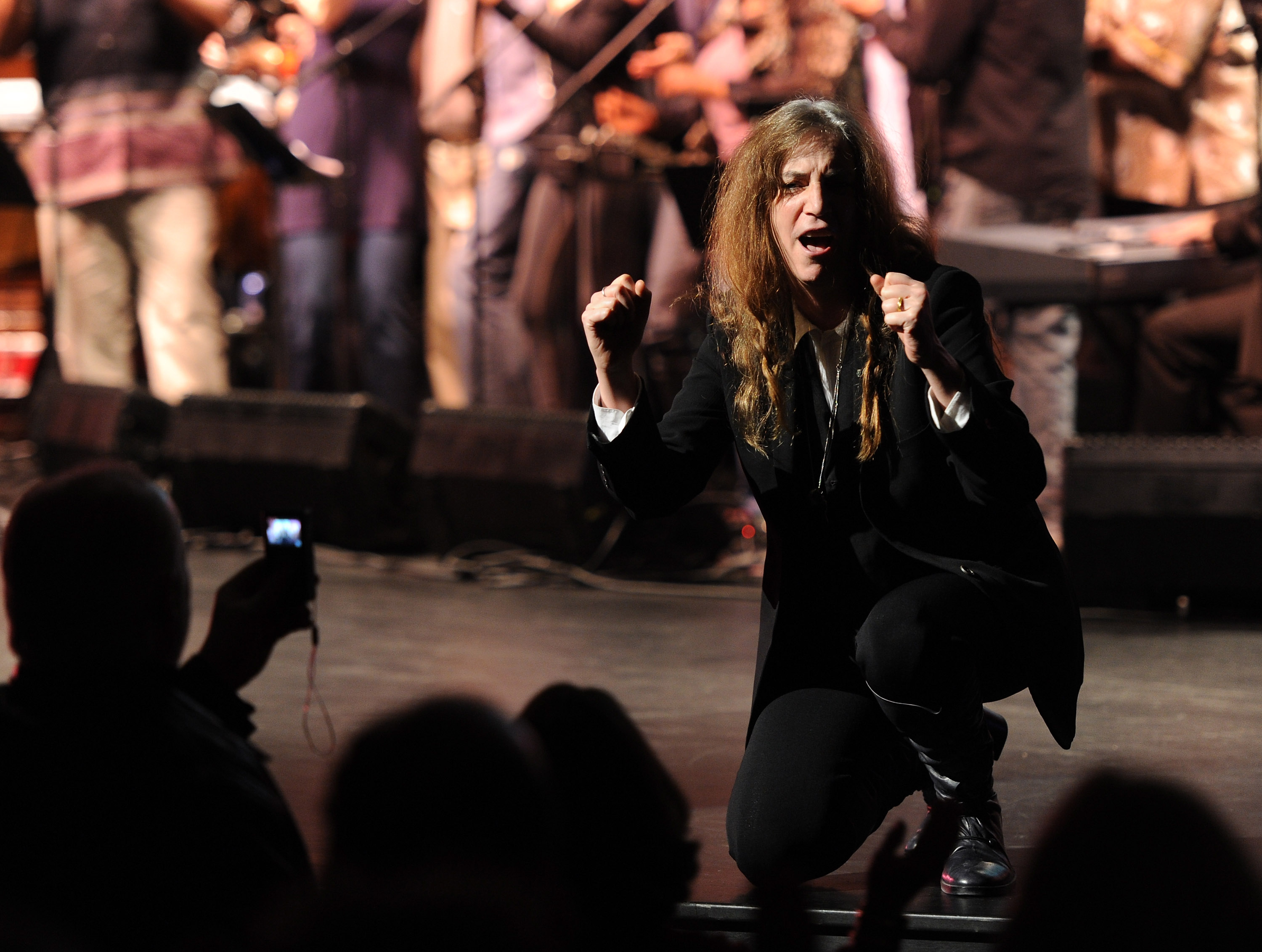 NEW YORK - NOVEMBER 12: Singer Patti Smith performs during Theatre Within's 30th Annual John Lennon Tribute Concert Benefitting the Playing For Change Foundation at the Beacon Theatre on November 12, 2010 in New York, City. (Photo by Stephen Lovekin/Getty Images)