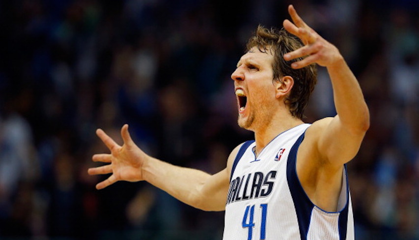 DALLAS, TX - APRIL 12: Dirk Nowitzki #41 of the Dallas Mavericks reacts after making a three point shot against the Phoenix Suns in the third quarter at American Airlines Center on April 12, 2014 in Dallas, Texas. (Photo by Tom Pennington/Getty Images)
