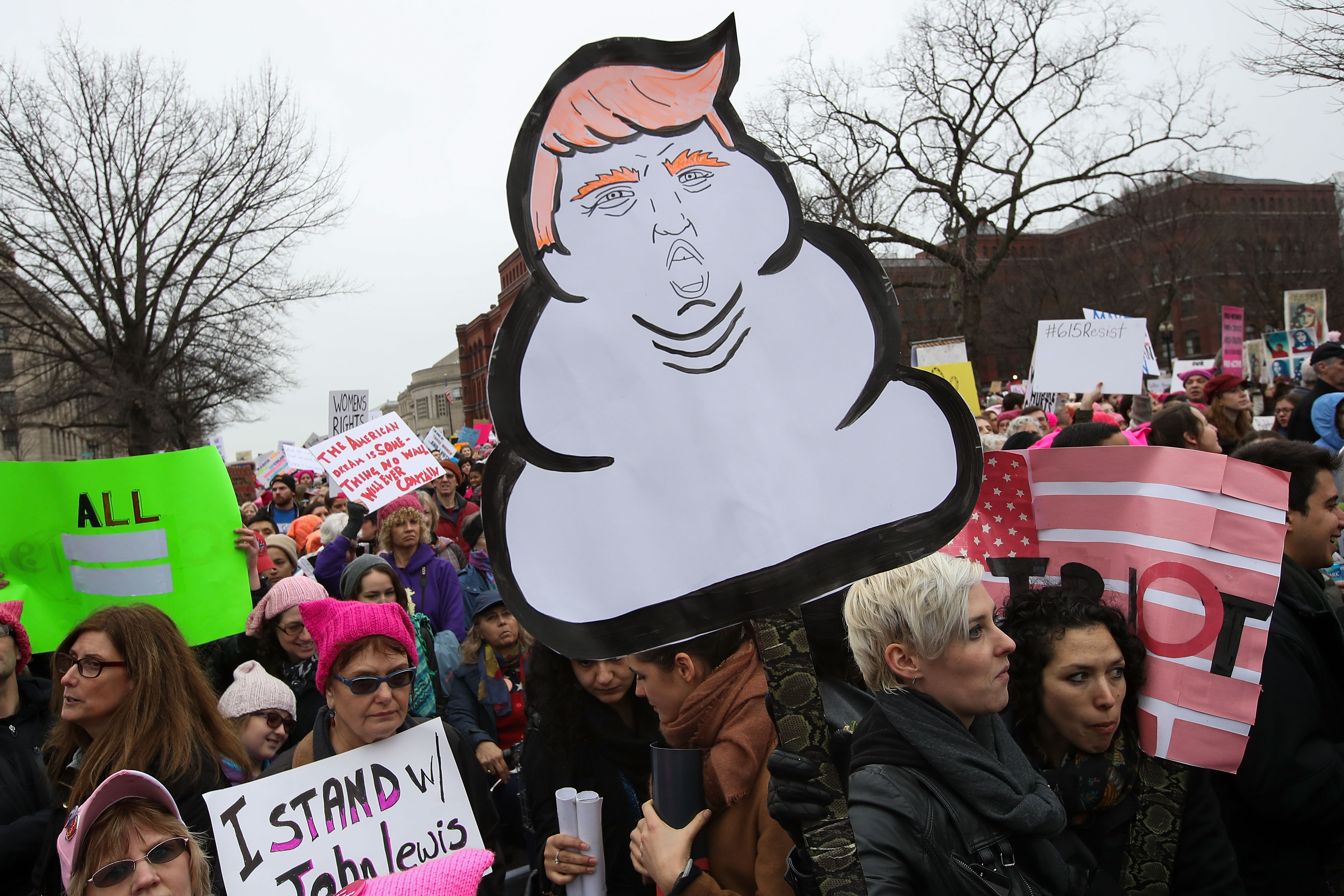WASHINGTON, DC - JANUARY 21: Protesters march along 14th Street during the Women's March on Washington January 21, 2017 in Washington, DC. Large crowds are attending the anti-Trump rally a day after U.S. President Donald Trump was sworn in as the 45th U.S. president. (Photo by Drew Angerer/Getty Images)