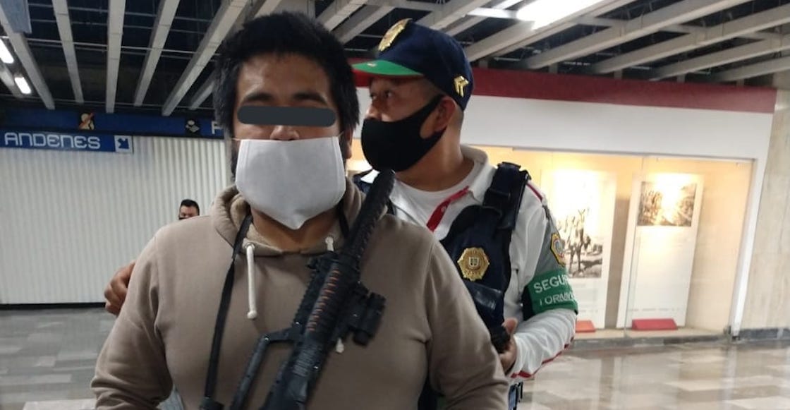 sujeto-ametralladora-metro