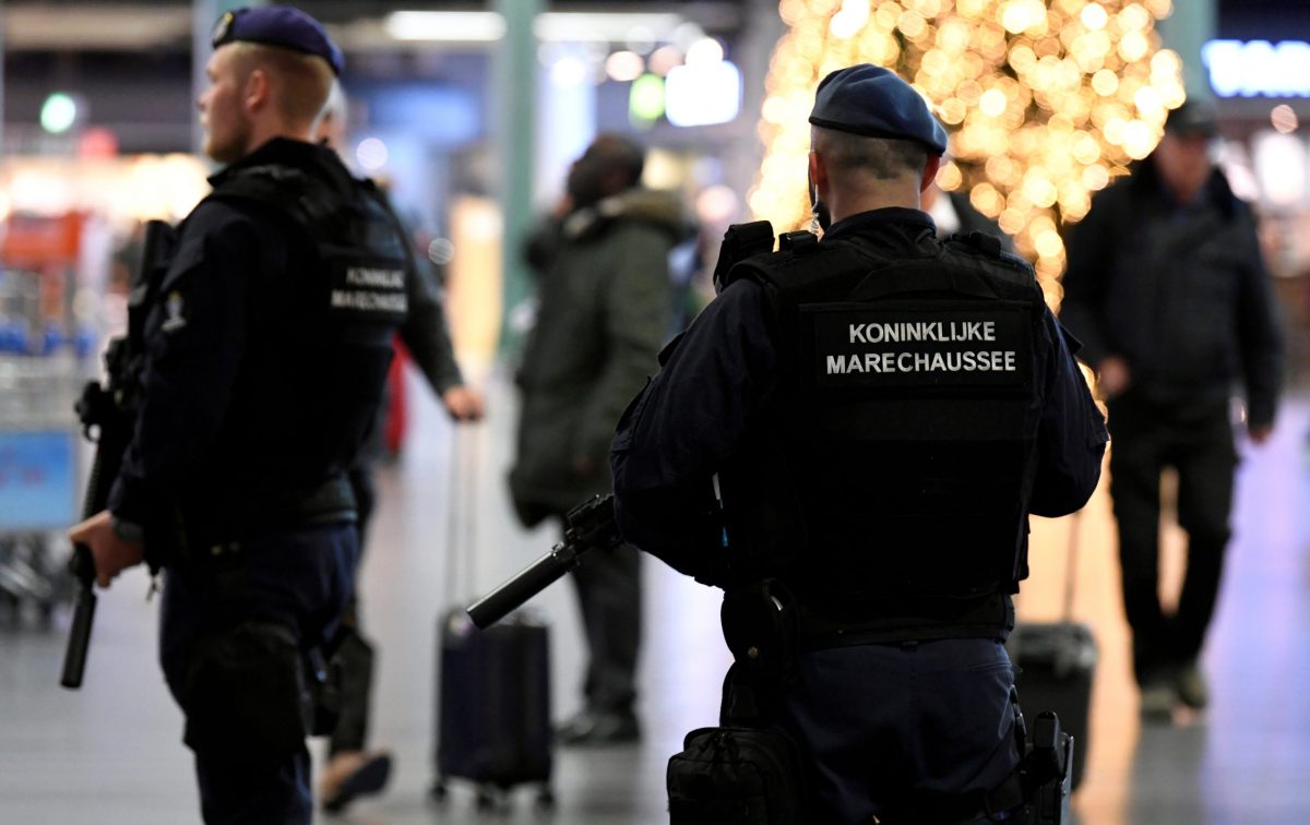 FILE PHOTO: Dutch police patrol at Amsterdam's Schiphol airport, November 6, 2019.