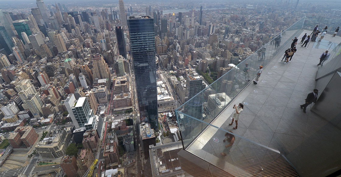 People take in the view of New York City from Edge, the new observation deck on the 100th floor of 30 Hudson Yards, New York, NY, on September 9, 2020. Offering panoramic views of New York City and New Jersey from 1,131 feet high, recently reopened Edge is the highest outdoor sky deck in the Western Hemisphere.
