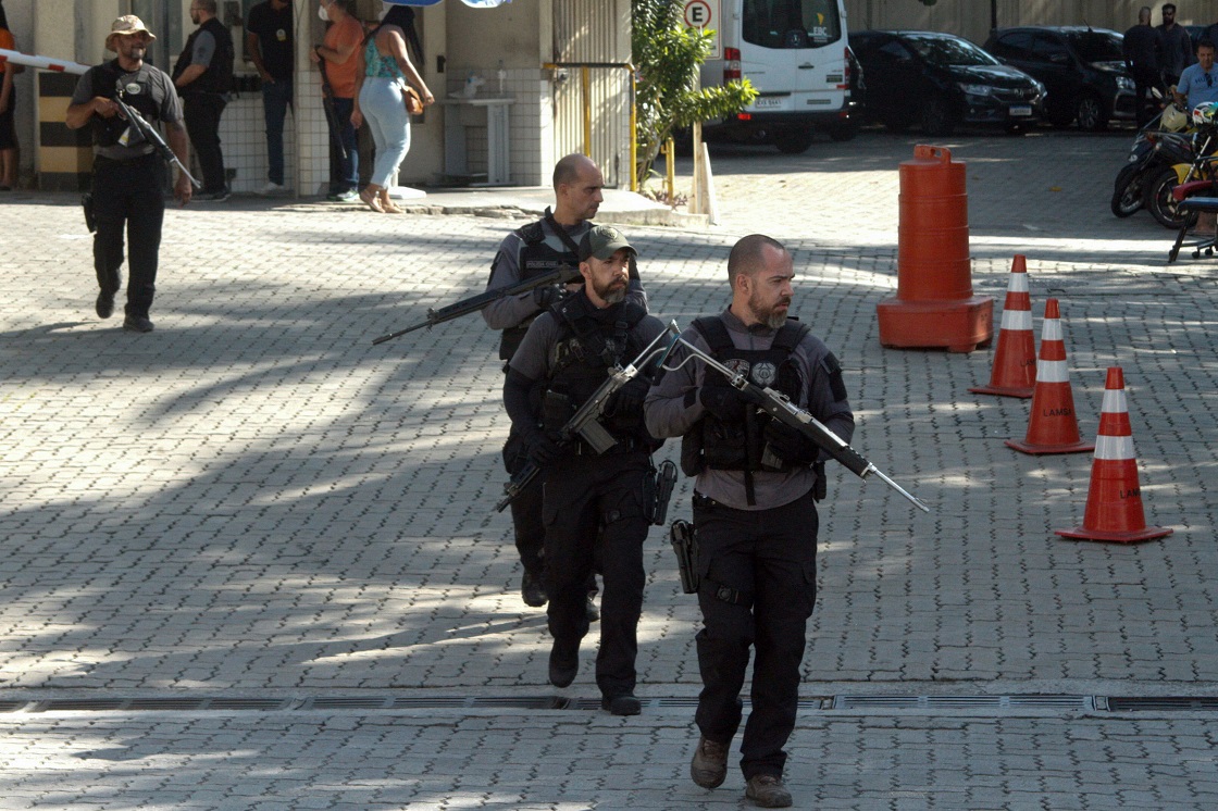 Police officers carry out an operation against gangs in the favela Jacarezinho where at least 25 people have died in a shoot-out during the raid.