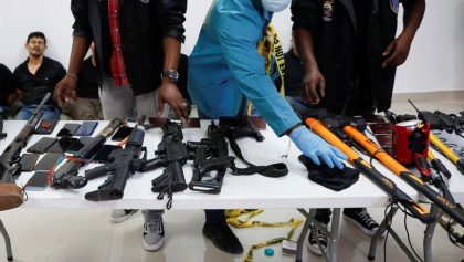 Weaponry, mobile phones, passports and other items are being shown to the media along with suspects in the assassination of President Jovenel Moise, who was shot dead early Wednesday at his home, in Port-au-Prince, Haiti July 8, 2021.