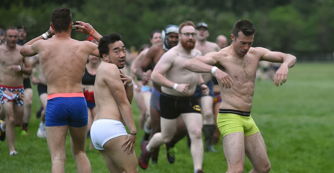 Participants run in their underwear during a Guinness World Record attempt for the largest gathering of people in their underwear at Burghley House, Stamford.