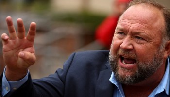 FILE PHOTO: Infowars founder Alex Jones speaks to the media after appearing at his Sandy Hook defamation trial at Connecticut Superior Court in Waterbury, Connecticut, U.S., October 4, 2022.
