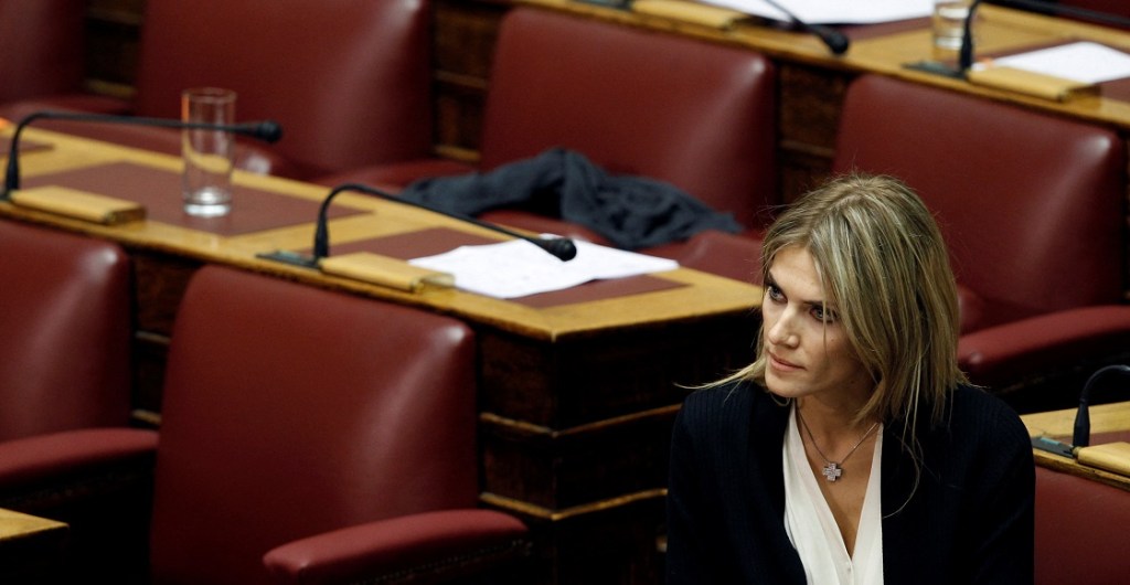 FILE PHOTO: Lawmaker Eva Kaili is seen in the parliament in Athens November 4, 2011, prior to a confidence vote. Kaili had announced she would stay in the party but refused to support the government in the confidence vote expected late on Friday, meaning Prime Minister George Papandreou could count at most on the support of 151 deputies.  