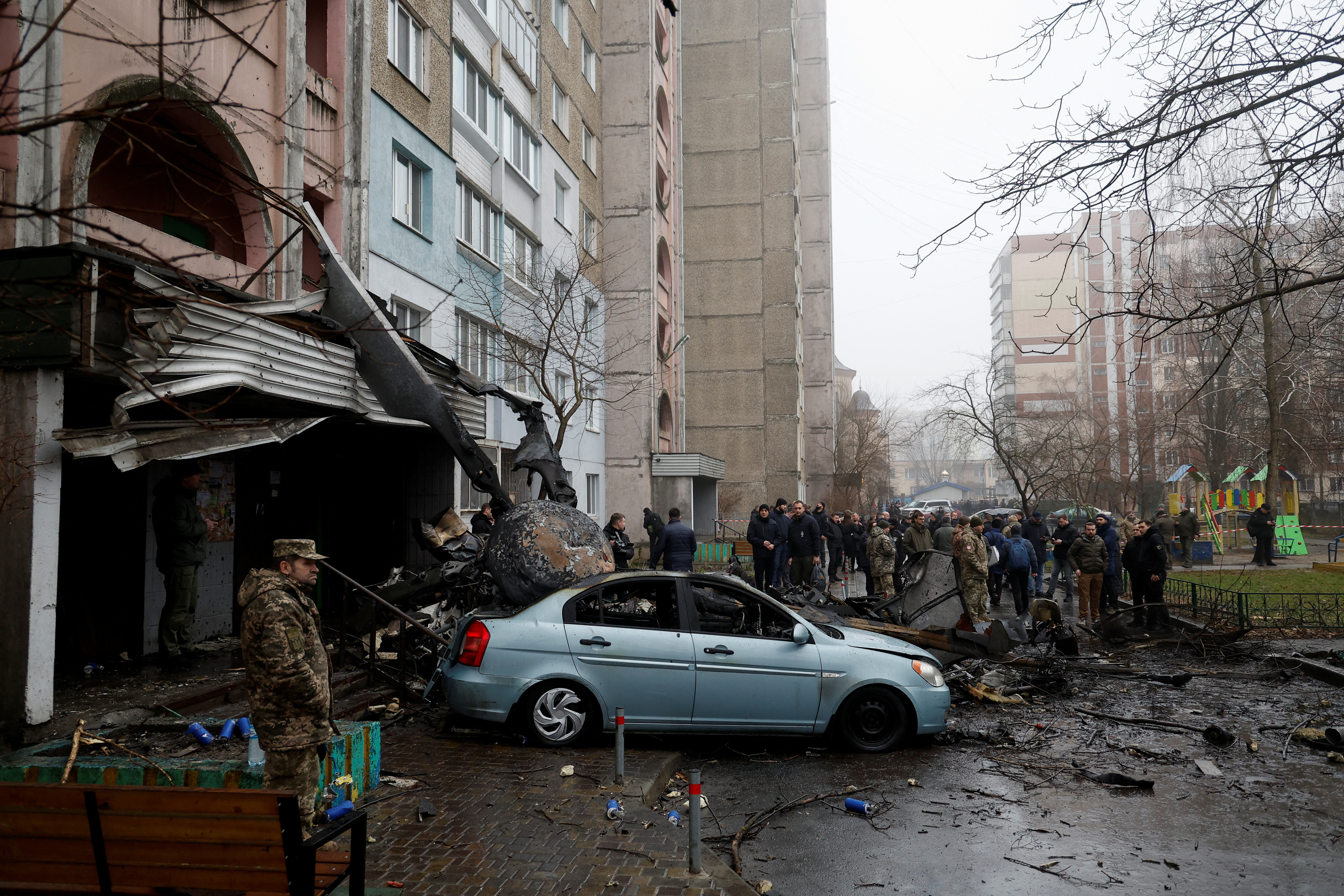 A view shows the site where a helicopter falls on civil infrastructure buildings, amid Russia's attack on Ukraine, in the town of Brovary, outside Kyiv, Ukraine, January 18, 2023.